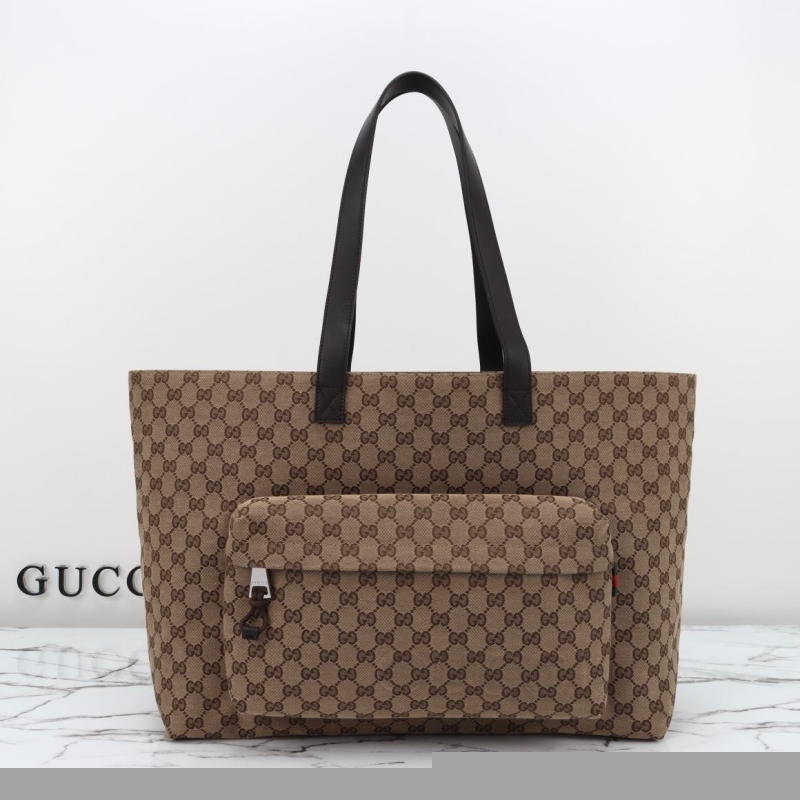 G*u*i shopping bags
